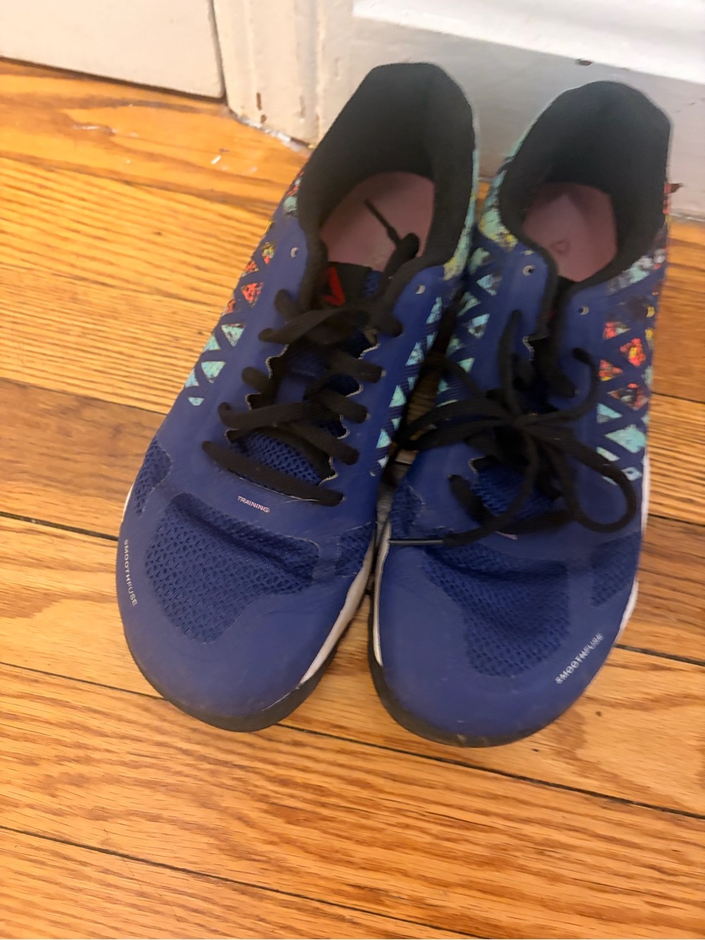 Reebok Women's Blue Athletic Running Shoes with Multicolor Accents